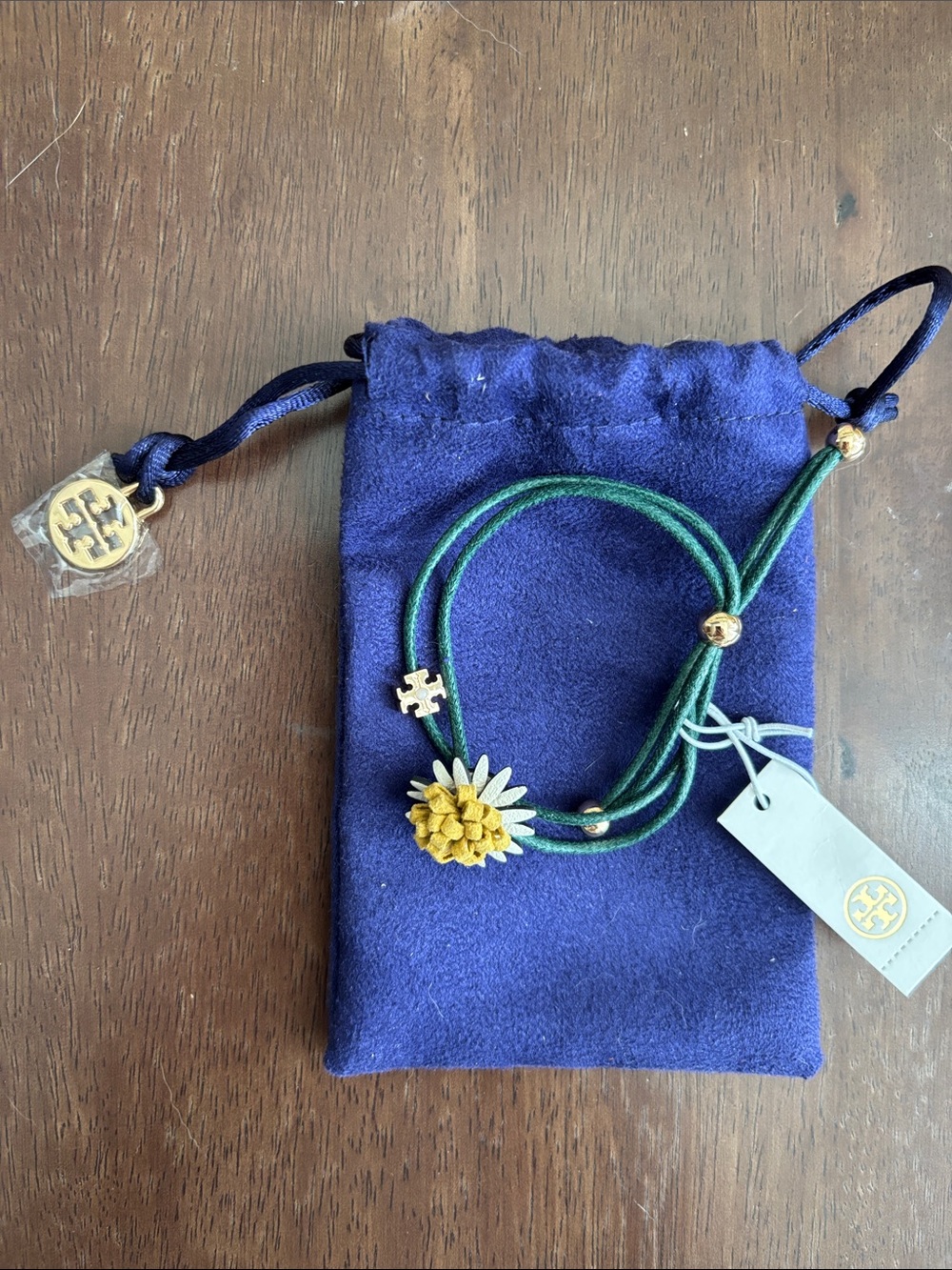 BNWT Tory Burch Green Suede Cord Bracelet with Yellow Flower and Gold Accents